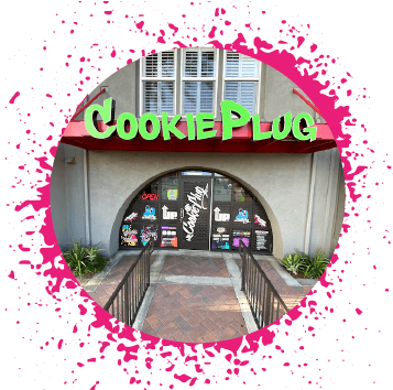 Cookie-Plug-bakery-in-Anaheim-CA Bright neon green sign over a gray storefront that says 'Cookie Plug' that has graffiti stickers on the door